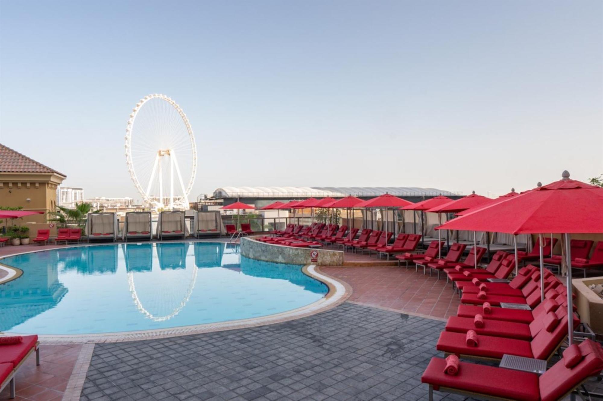 Amwaj Rotana, Jumeirah Beach - Dubai Exterior photo The pool at the Hilton Dubai Palm