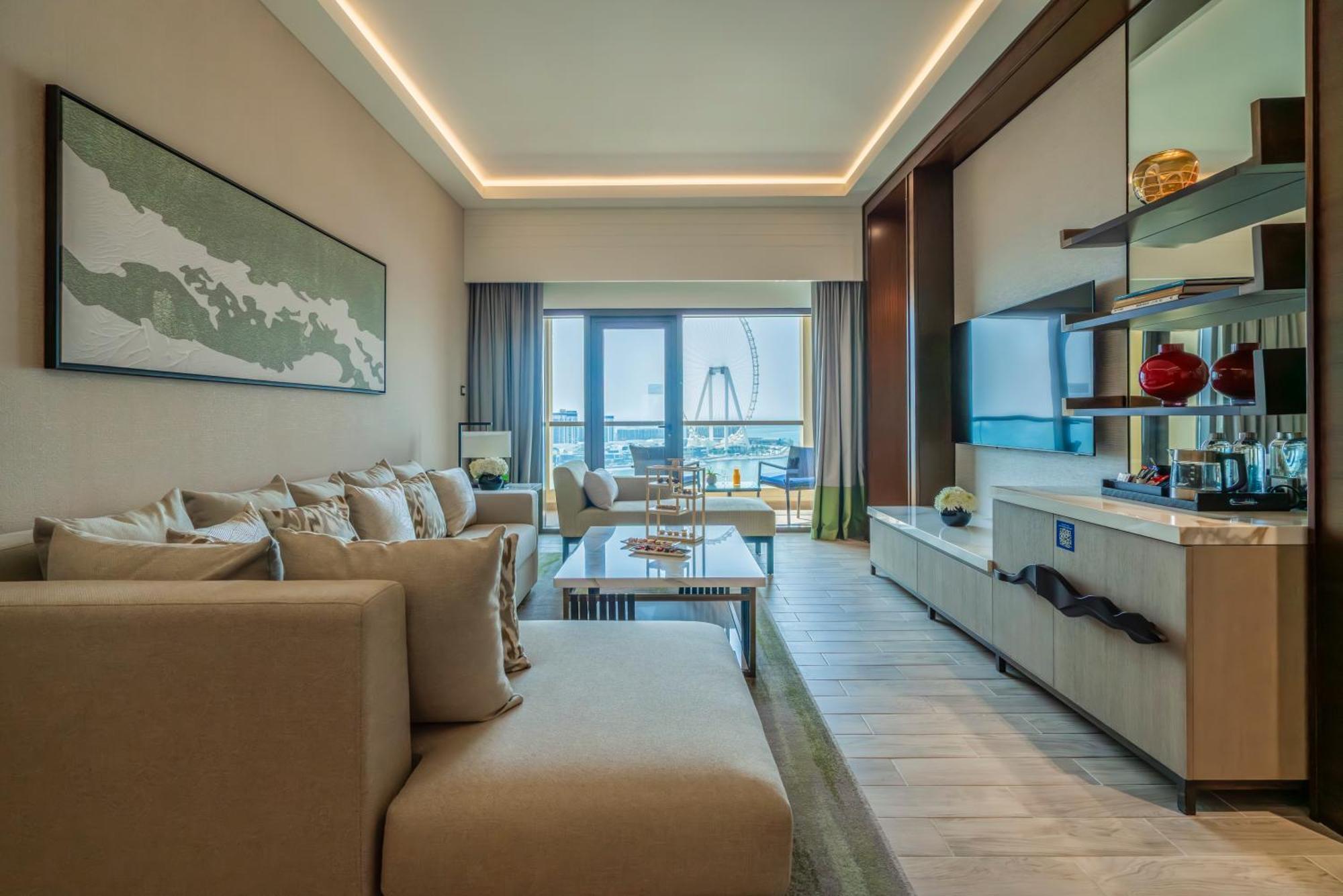 Amwaj Rotana, Jumeirah Beach - Dubai Room photo A living room at the Ritz-Carlton, DIFC