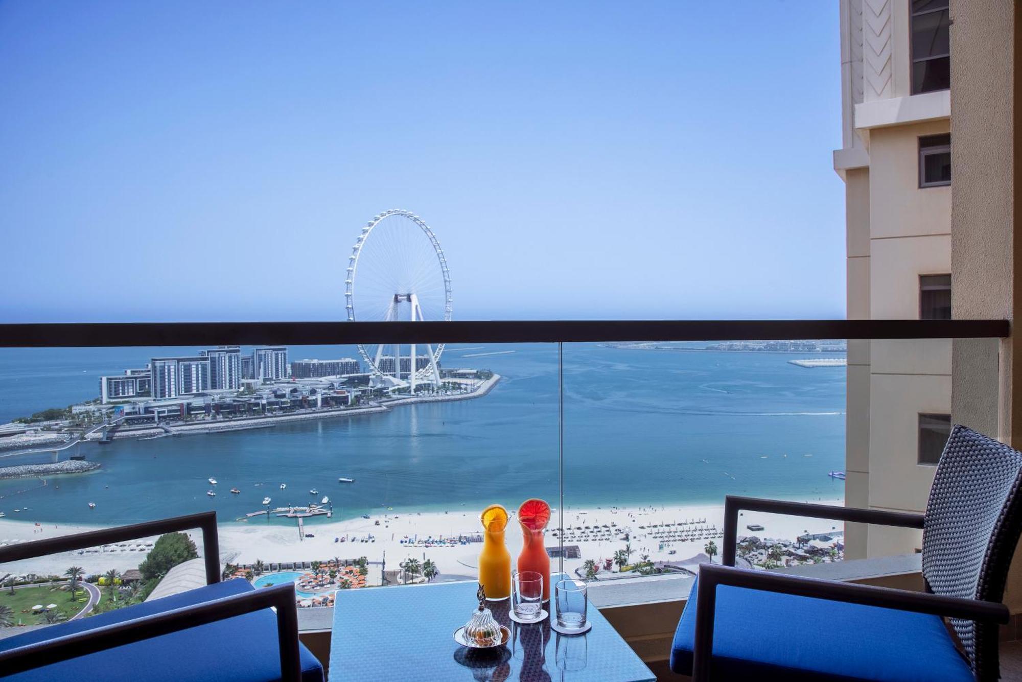 Amwaj Rotana, Jumeirah Beach - Dubai Room photo View of the Palm Jumeirah from the Jumeirah Beach Hotel